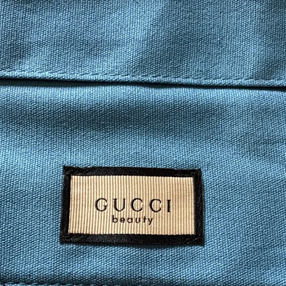 BNWOT BLUE Canvas Buttoned Pouch By Gucci Beauty